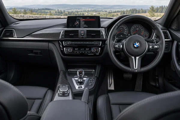 BMW M3 Competition F80 dashboard — right-hand-drive cabin example