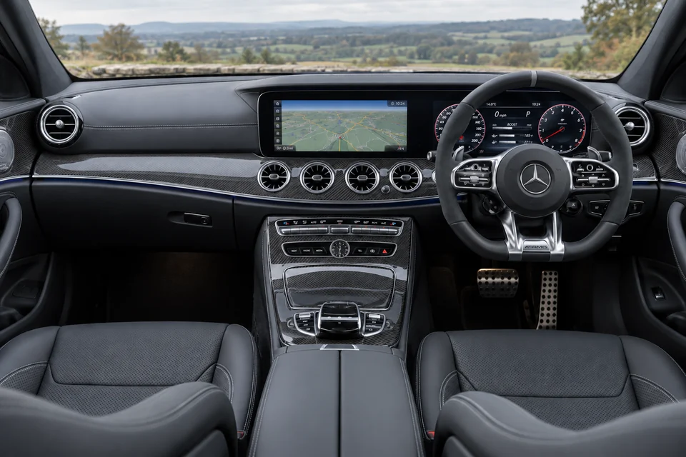 Inside the E63 S W213 — performance cabin, right-hand-drive layout